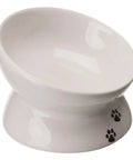 Comedero de cerámica elevado Trixie blanco con huellas negras de 15 cm de alto para gato
