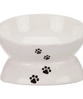 Comedero de cerámica elevado Trixie blanco con huellas negras de 15 cm de alto para gato